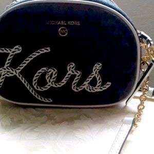 Michael Kors, blue white, and gold with  straps all around bag 💯